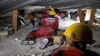 Rescuers race to find survivors after Indonesia school collapse traps dozens