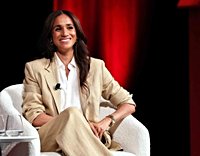 Meghan Markle Embraces Minimalist Chic in a Beige Power Suit and One of Her Go-To Accessories