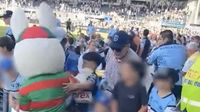 Bizarre moment Rabbitohs mascot appears to push a nine-year-old fan