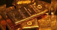 Gold hits 2-week low as trade optimism, China holiday weigh on prices