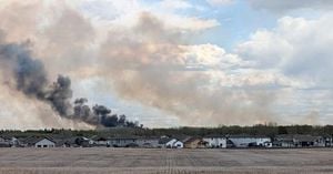 Evacuation Orders Issued As Wildfire Threatens Grande Prairie Area