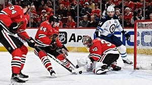 Knight Shines As Blackhawks Blank Jets In Toews 27 Emotional Return