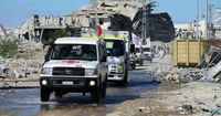 Israel tells UN it plans to halve aid into Gaza amid partial return of slain hostages