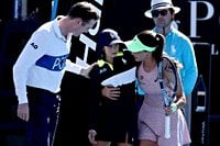 Tennis player interrupts Australian Open match to assist ball kid after collapse