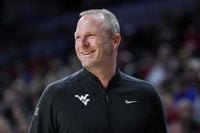 Indiana hires West Virginia coach Darian DeVries as next head coach