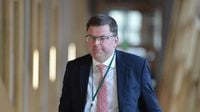Scottish Labour MSP appears in court charged over 'voyeurism' & 'indecent pics'