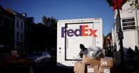FedEx shares slide as annual forecast cuts stoke worries on economy