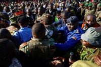 Thousands Gather To Bid Farewell To Late Kenyan Opposition Leader After Violent Week