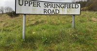 Four PSNI officers injured as two police cars rammed in west Belfast pursuit