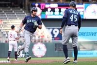 Raleigh hits one of Seattle's four homers as Mariners romp over Twins 11-2