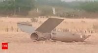 Security personnel retrieve parts of a missile seen in Haryana's Sirsa | India News - The Times of India