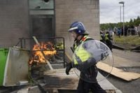Rioter jailed for stoking fire outside asylum hotel