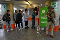 Military and police patrol streets of Peru’s capital as state of emergency begins