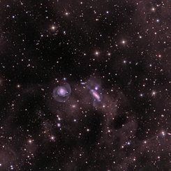Dust and the NGC 7771 Group