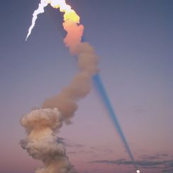 Shuttle Plume Shadow Points to Moon