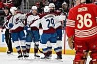 MacKinnon scores twice to become the 1st 40-goal scorer of the season, Avalanche blank Red Wings 5-0