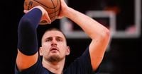 Nikola Jokic injures left knee in Denver Nuggets game against Miami Heat