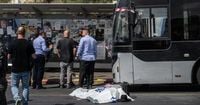 Palestinian gunmen kill six people in attack on Jerusalem bus stop
