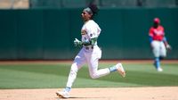 Dodgers get speedy Ruiz in trade with Athletics