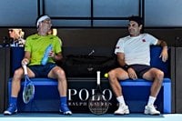 Casper Ruud reacts to losing a practise tie-break to Roger Federer at the Australian Open