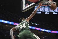 Antetokounmpo's 2nd straight triple-double lifts Bucks over Heat in OT, 121-115
