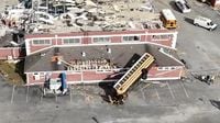 School Bus Thrown on Gym by Tornado | WeatherBug