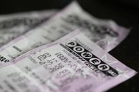 Two tickets in MO, TX to split $1.8B Powerball
