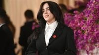 Billie Eilish violently grabbed and pulled into barricade during Miami concert