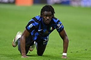 Tottenham And Manchester United Battle For Bisseck