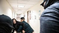 ICE officer caught on video pushing woman is placed on leave