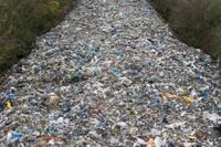 Man arrested in connection with fly-tipping waste mountain
