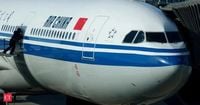 Video shows passengers terrified as fire suddenly erupts in Air China plane, forcing emergency landing