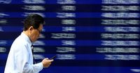 Shares skid in Asia as Nvidia curbs fan worries, gold surges to record