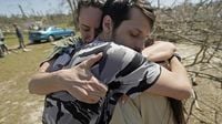 Residents pick up the pieces after devastating storms scour the US South and Midwest