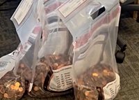 Local banks adapt as penny production ends, advising continued use of existing coin stock