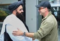 Taliban claim an agreement is reached with US envoys on a prisoner swap as they seek better ties