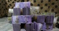 Exclusive: Syria to revalue currency, dropping two zeros in bid for stability, sources say