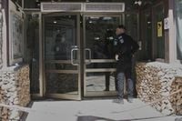 2 people are stabbed at a hotel outside Jerusalem. Israeli police say it's a militant attack