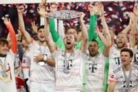 Kane celebrate maiden trophy win
