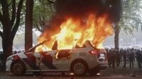 Police car torched, rocks thrown in Dutch anti-immigration protest; 30 arrested