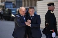 Macron, Tusk sign France-Poland treaty with mutual defence clause: AFP