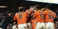 Picked off in the 9th, Fitzgerald walks off in the 10th on wild pitch
