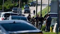 Two women killed at Kentucky church as gunman opens fire after shooting officer