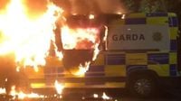 Bricks and bottles thrown at officers - and police helicopter targeted with lasers - as protests turn violent in Dublin