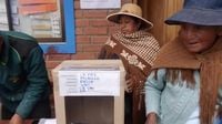 Presidential candidates votes as Bolivia holds a tight runoff