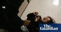 Ice officer ‘relieved of duties’ after video shows him manhandling woman at New York immigration court
