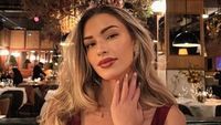 Louis Tomlinson is seen enjoying a romantic meal with Zara McDermott