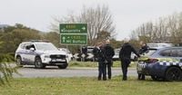 Australian police hunt for gunman who killed 2 officers and shot another in a rural town