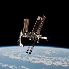 Space Shuttle and Space Station Photographed Together