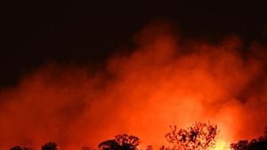 Bushfire Threatens Homes As Firefighters Battle Blaze